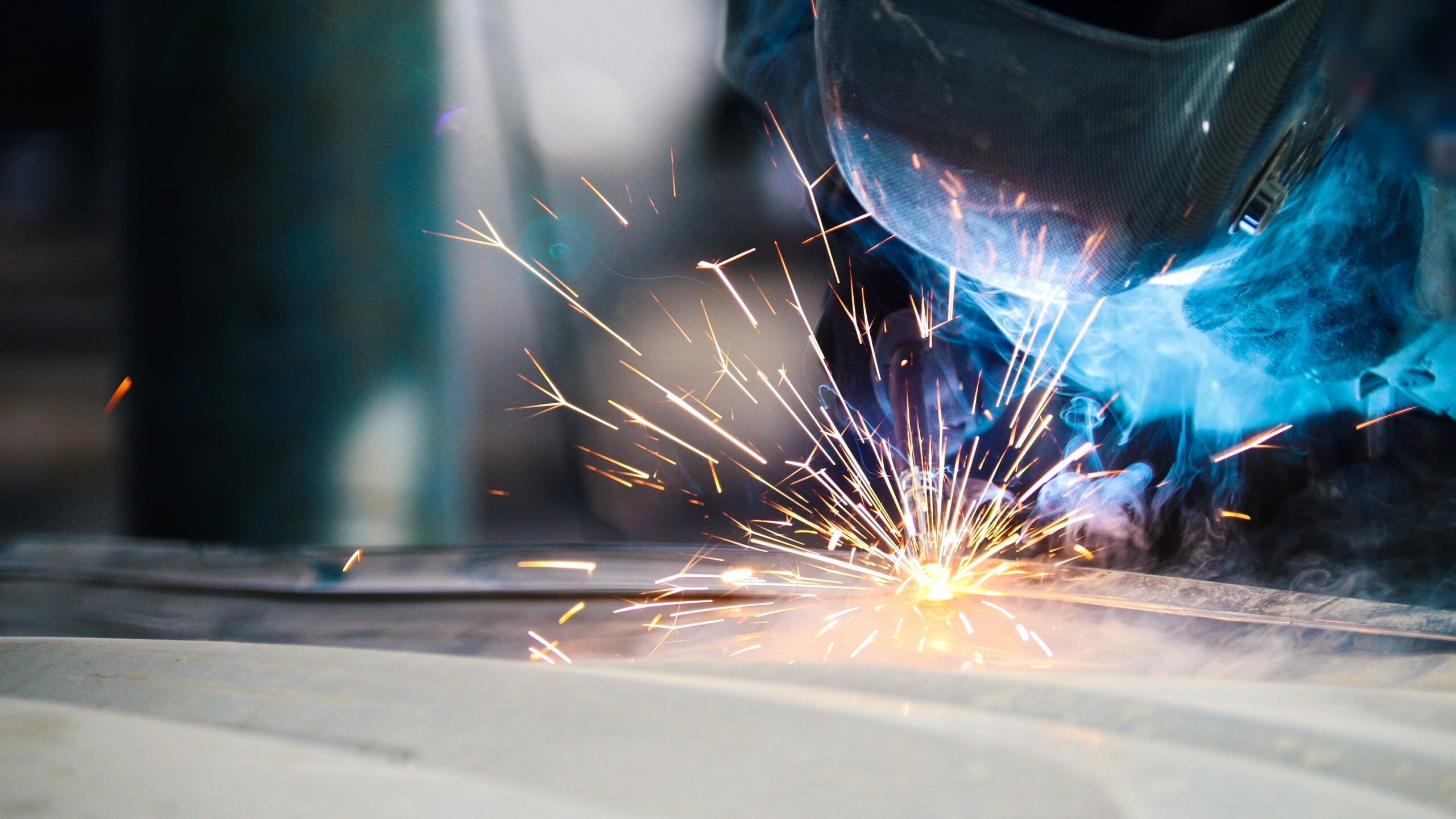 Employee welding steel - Youngstown Pipe & Steel careers